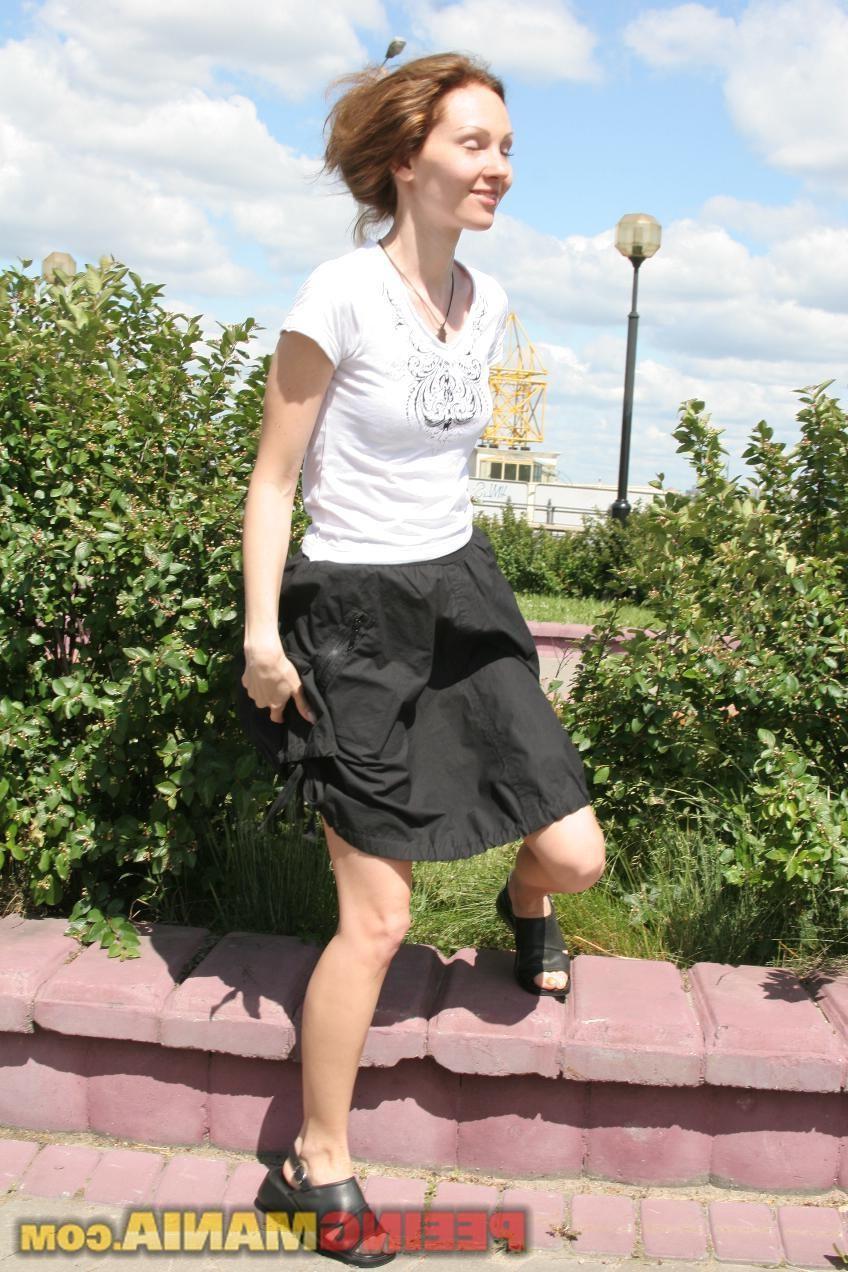 15P Happy blondie in black and white pees thru the black panties in public