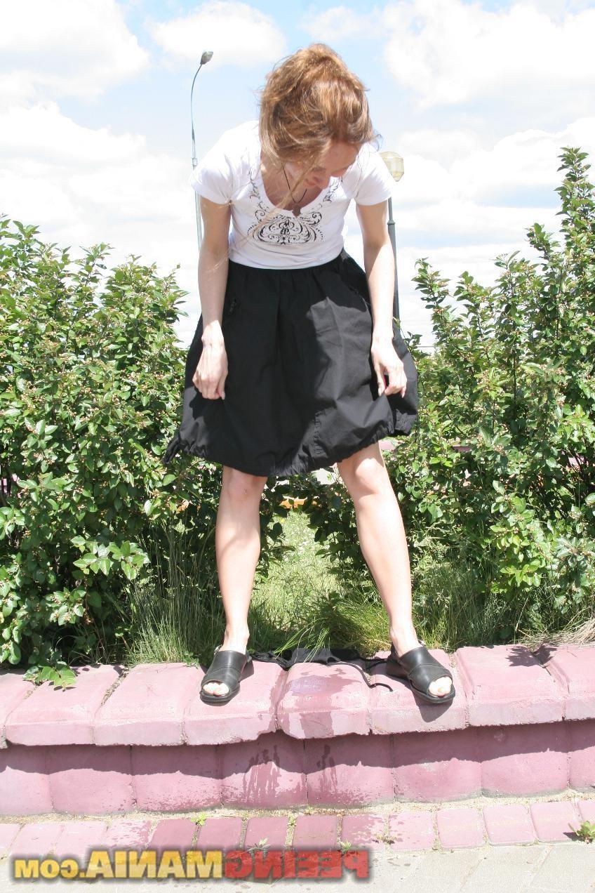 15P Happy blondie in black and white pees thru the black panties in public