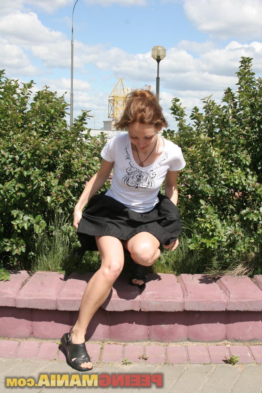 15P Happy blondie in black and white pees thru the black panties in public