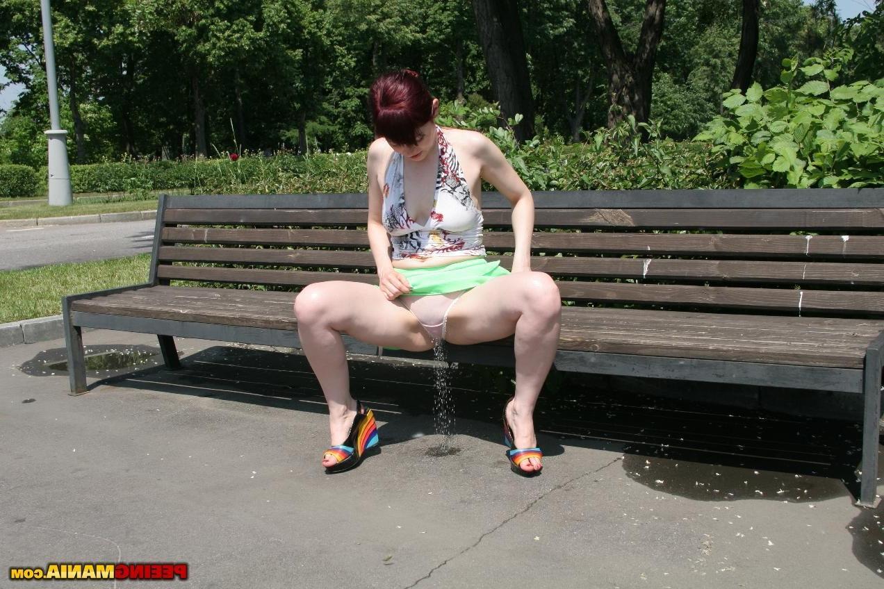 11P Total bitch spreads her legs wide and pees thru panties on the bench