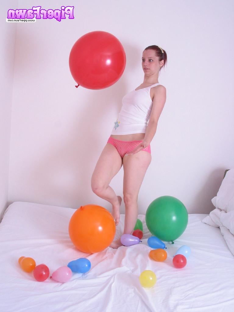 16P Busty redhead teen plays with balloons