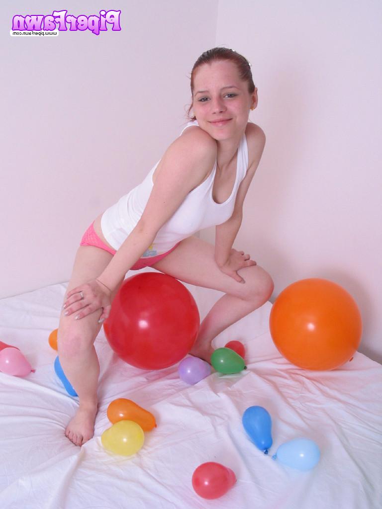 16P Busty redhead teen plays with balloons