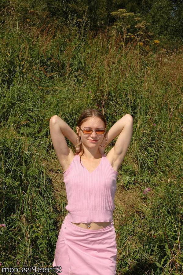 12P Leggy young hottie parades pee play on a bank