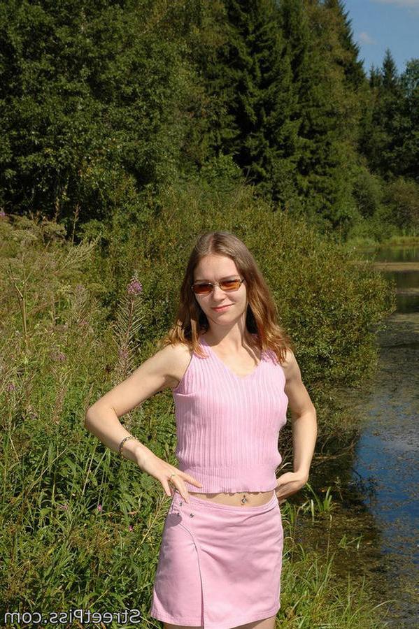 12P Leggy young hottie parades pee play on a bank