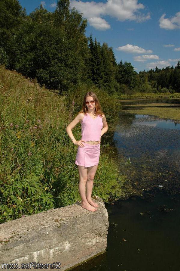 12P Leggy young hottie parades pee play on a bank