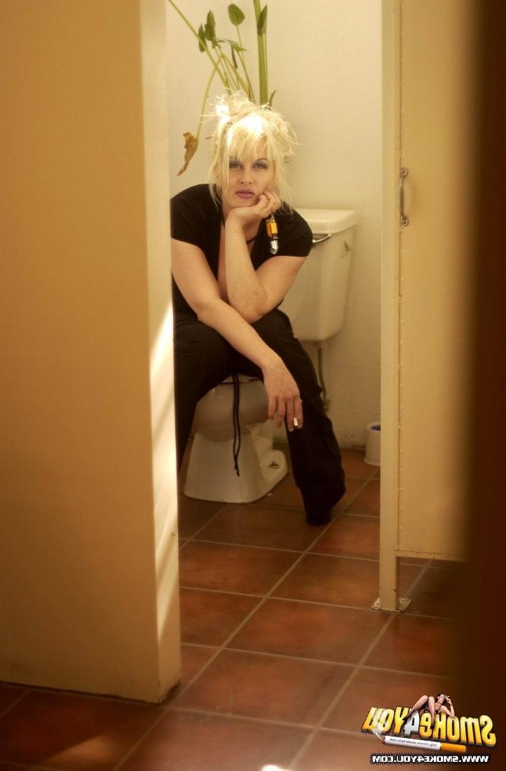 16P Huge Breasted White trash smokes like crazy on the toilet