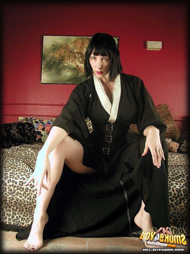 16P Katja relaxes with cigarette and shows off dirty feet