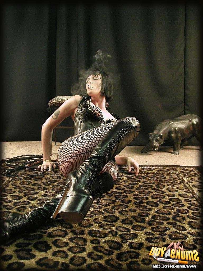 16P Katja shows off dominatrix outfit complete with cigarette