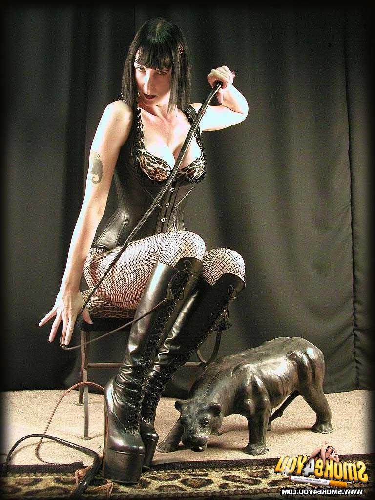16P Katja shows off dominatrix outfit complete with cigarette