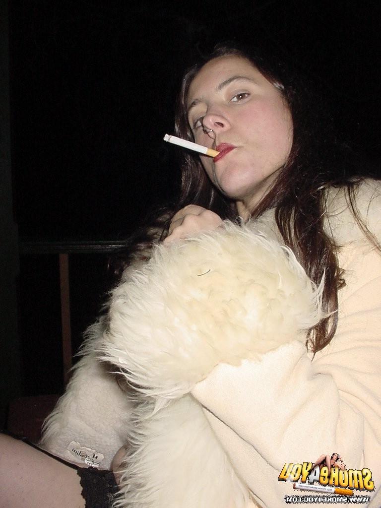 16P Abigail is catching a smoke at a crazy fetish party