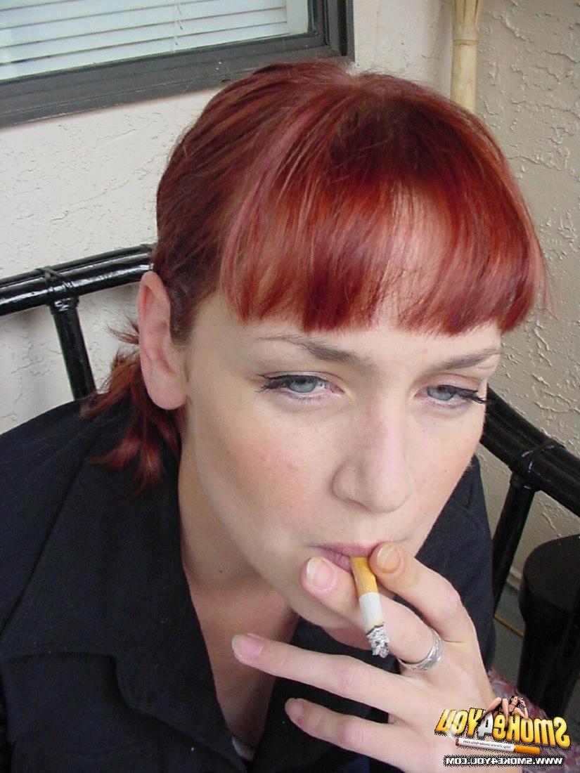 16P Cassandra steps outside to lazily smoke her cigarettes