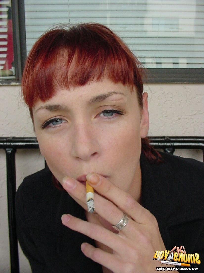 16P Cassandra steps outside to lazily smoke her cigarettes