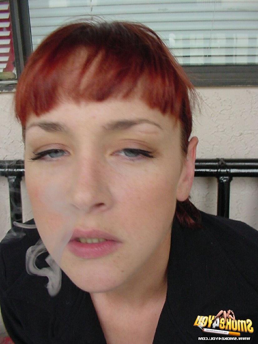 16P Cassandra steps outside to lazily smoke her cigarettes