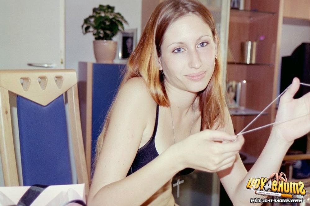 16P Bored coed Anette Yvonne puffs on a cigar