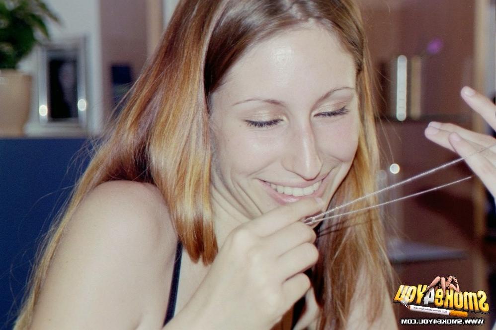 16P Bored coed Anette Yvonne puffs on a cigar