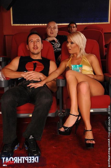 15P Cute blonde girl does blowjob in the cinema