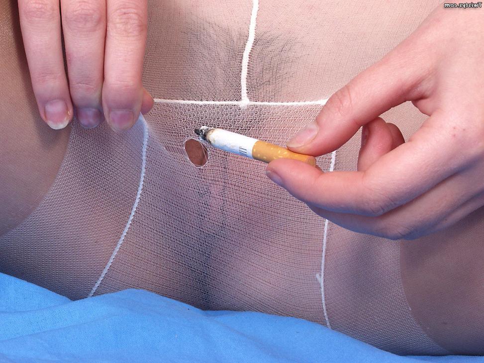 16P cigarette smoking brunette babe burns and rips her pantyhose