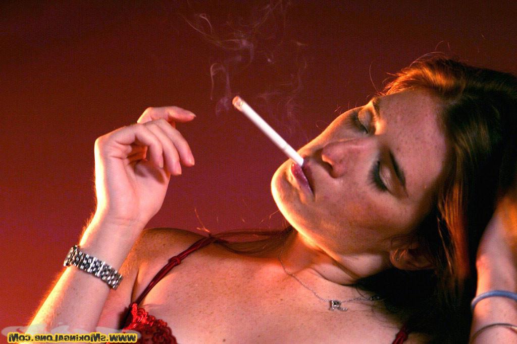 16P Babe rubs her pussy while she smokes a cigarette