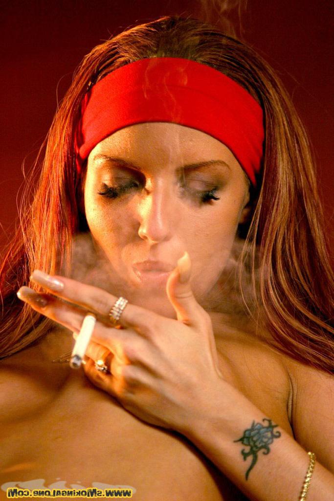 16P Petite slut fingers her pussy while she smokes a cigarette