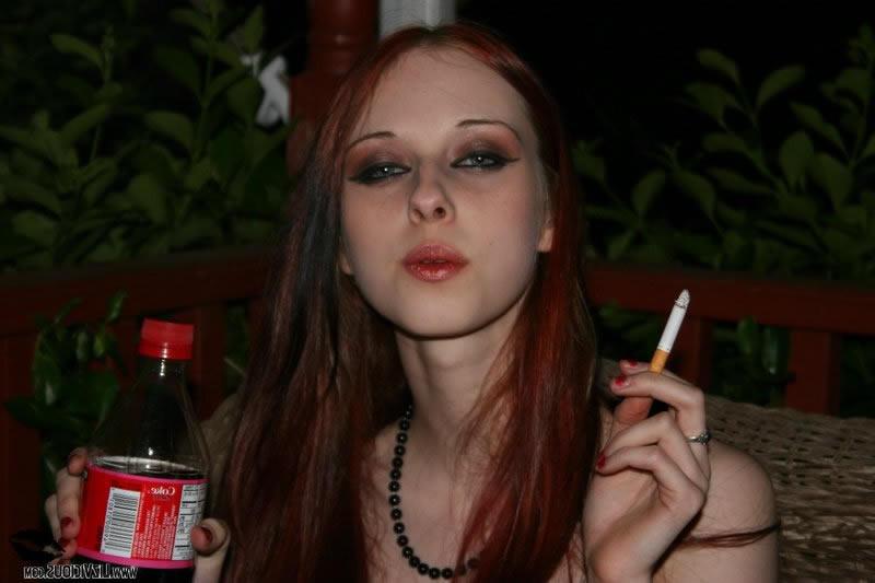 15P Redhead goth teen strips in the movie theater