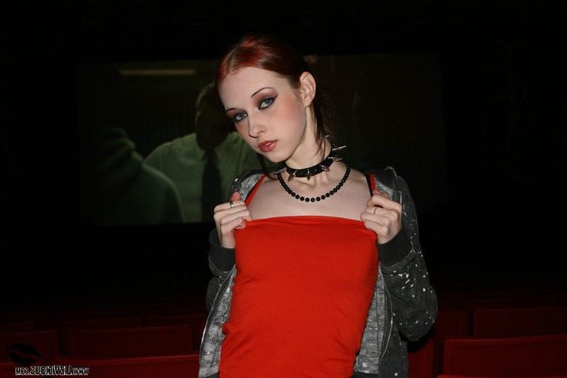 15P Redhead goth teen strips in the movie theater