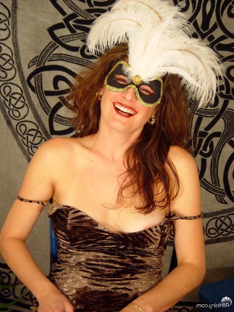 15P hairy mature lady strips everything including mardi gras mask