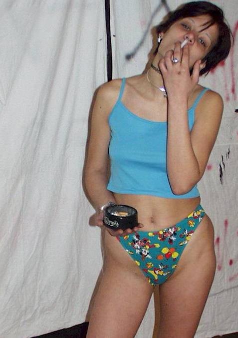 15P Bad teen girl smoking a cig