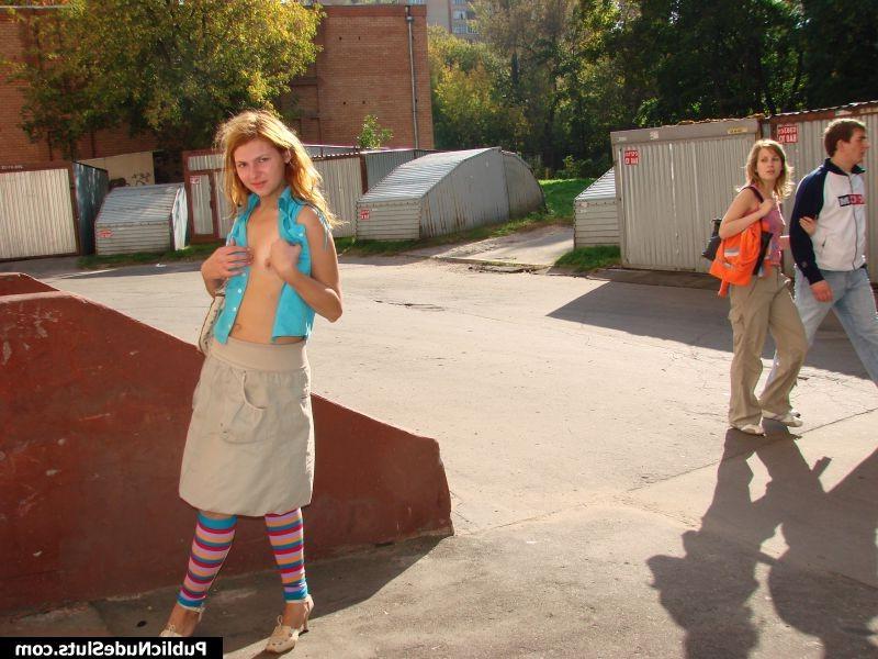 15P Unblushing chick makes a show of her nude intimate places in public
