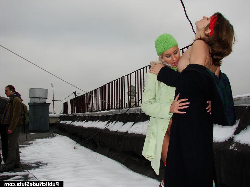 15P Naughty babe goads her girlfriend into lesbian experiments in public