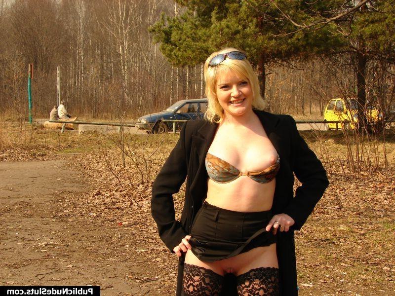 14P Chic blonde beauty in black lingerie and stockings flashes in public