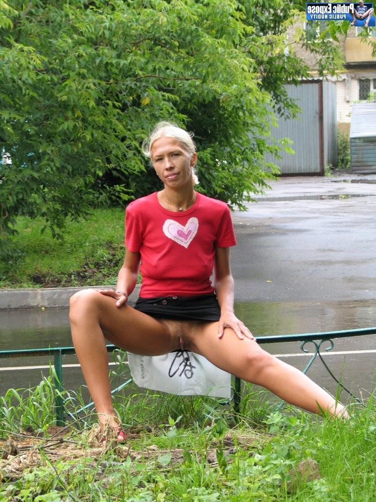 15P Excited blonde flasher plays with her boobs and snatches in public