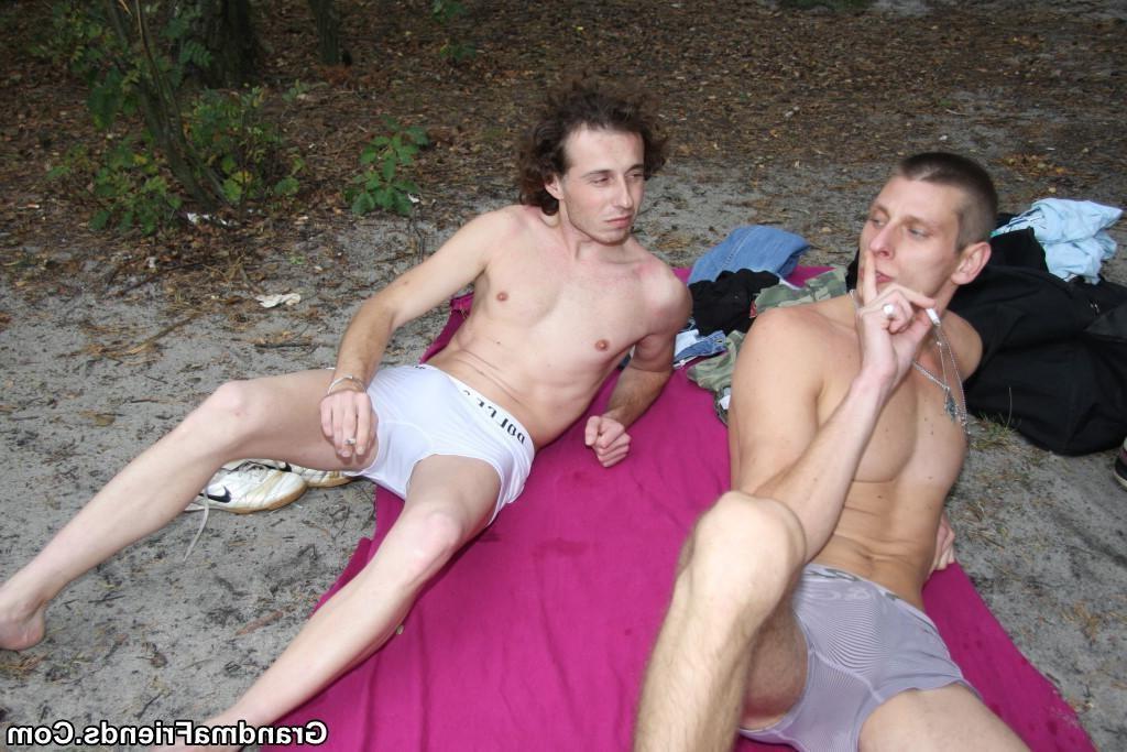 16P After they spend plenty of time fucking her on the beach the two young men cum o
