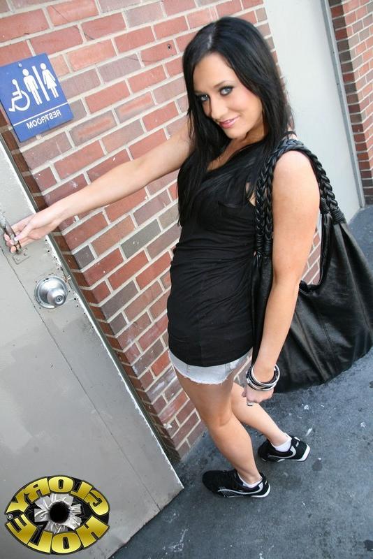 16P Pretty teen sucks a big black cock through a hole