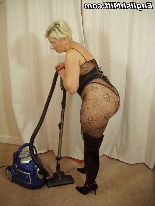 16P Kinky thigh booted Daniella doing the hoovering in her bodystock