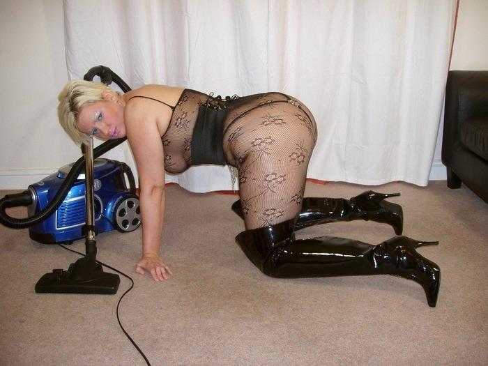 16P Kinky thigh booted Daniella doing the hoovering in her bodystock