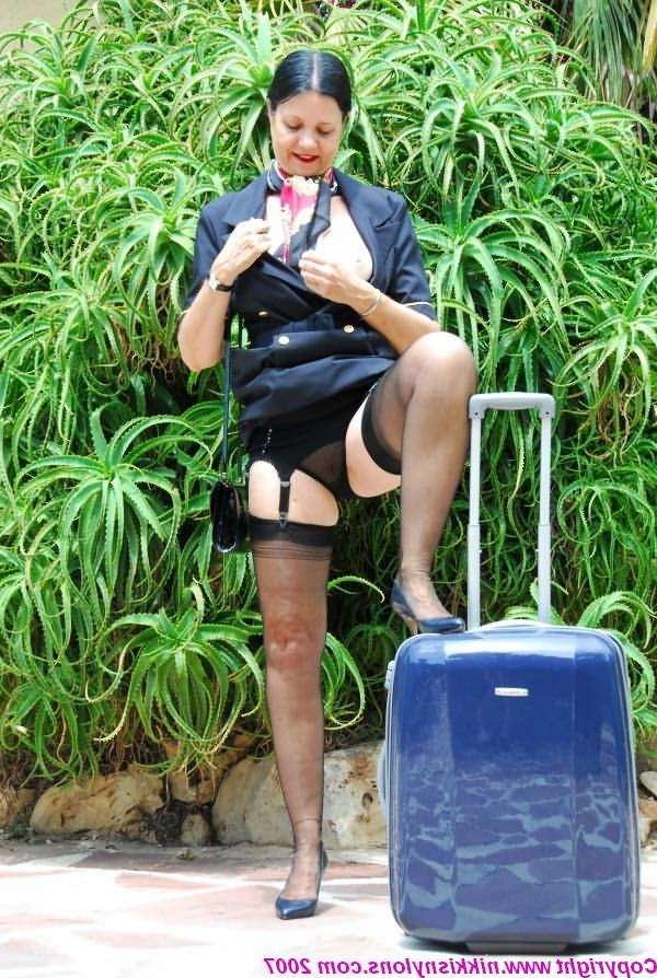 14P Mature Nikki in stockings and navy uniform