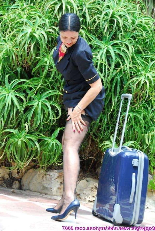 14P Mature Nikki in stockings and navy uniform