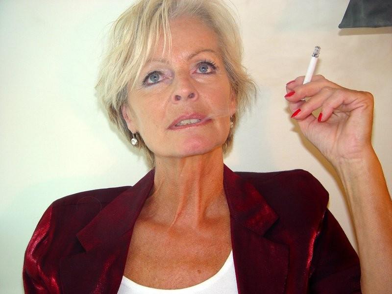 16P Hot old blonde babe enjoying a cigarette