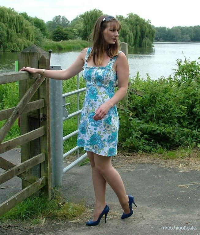 15P Stiletto girl in stockings posing outdoors