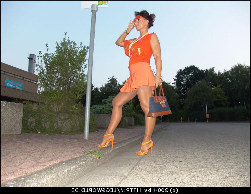 12P Leggy german lady in tan stockings posing in public