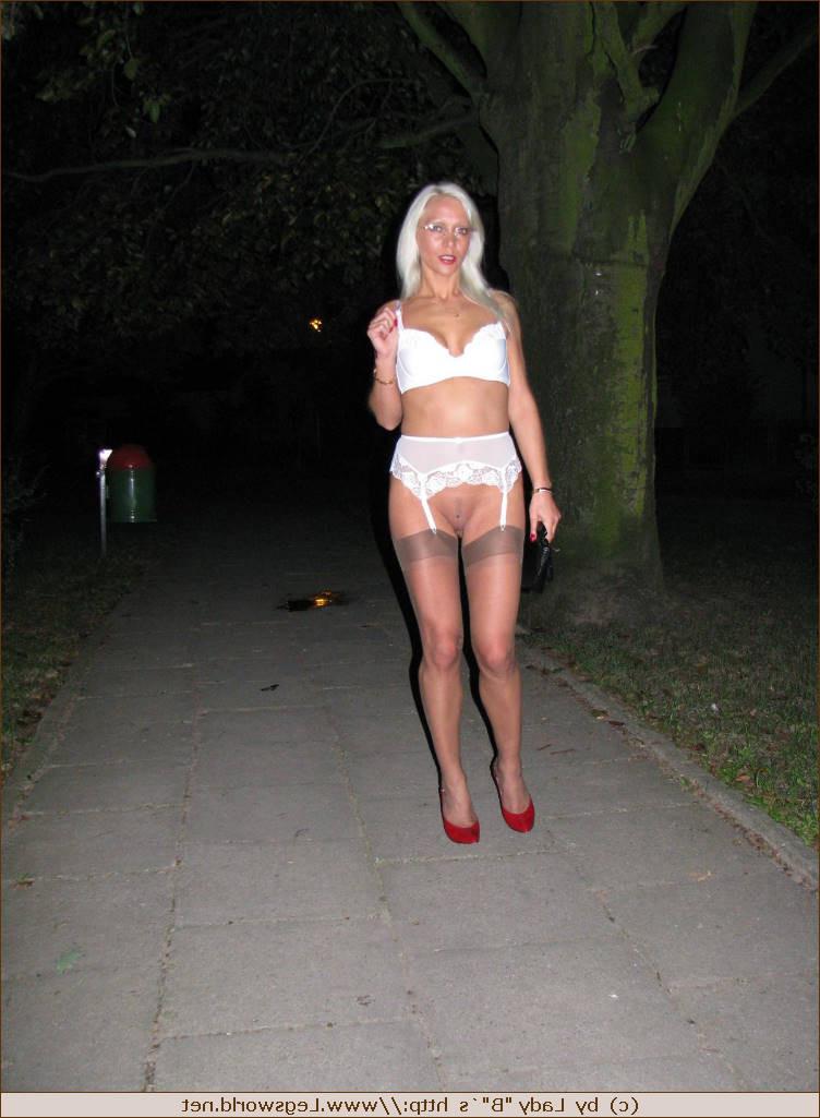 12P Amateur german babe in stockings posing in public