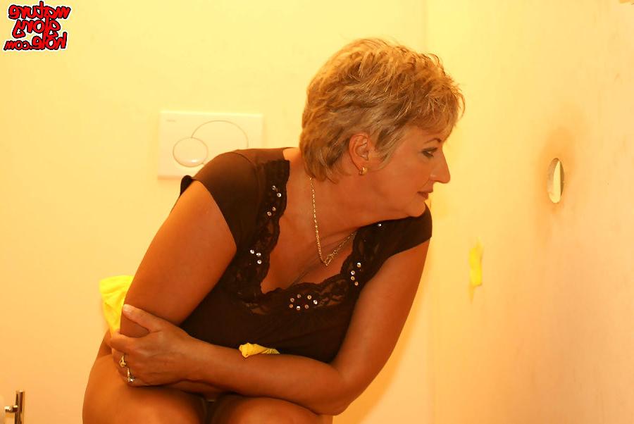 20P blonde mature meets her first big black cock at a glory hole