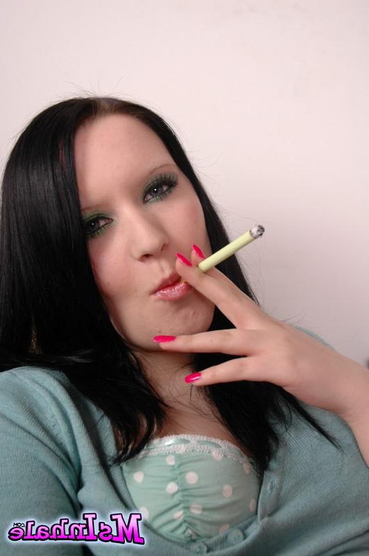 16P brunette teen smoking a cigarette
