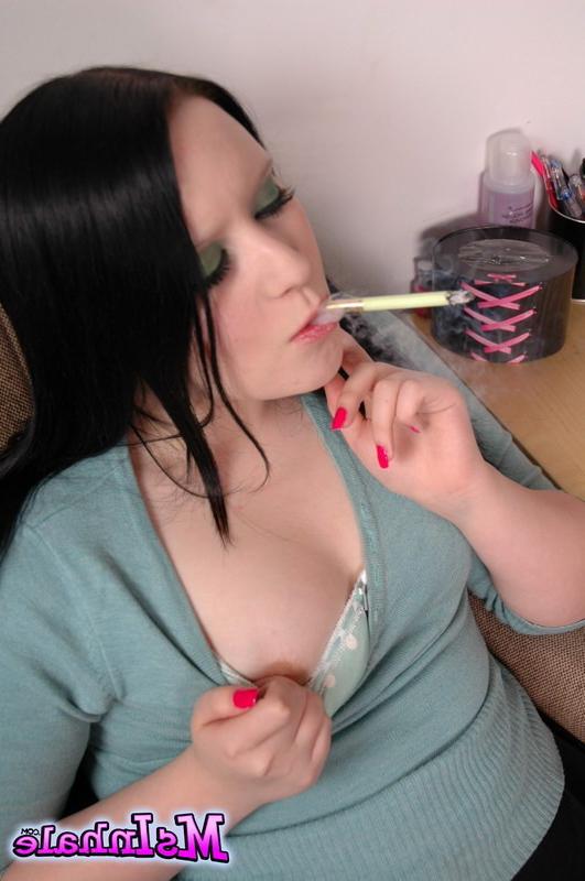 16P brunette teen smoking a cigarette