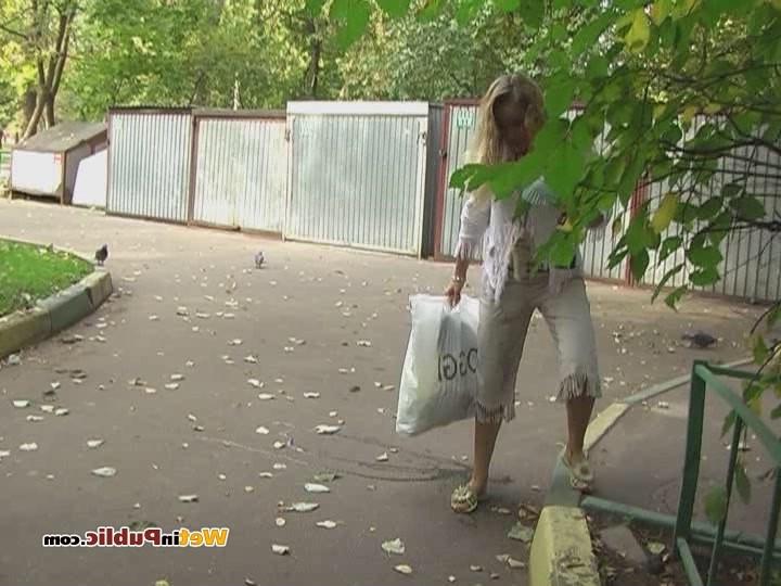 12P Blond has sipped some beer and pissed in her white breeches in public