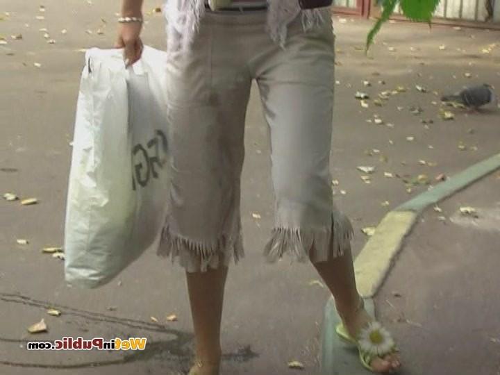 12P Blond has sipped some beer and pissed in her white breeches in public