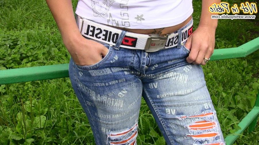 12P Red miss in the shades piss-drenches her fashion torn jeans outdoors