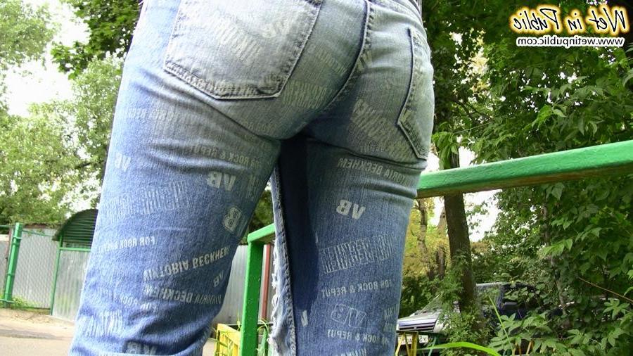 12P Red miss in the shades piss-drenches her fashion torn jeans outdoors