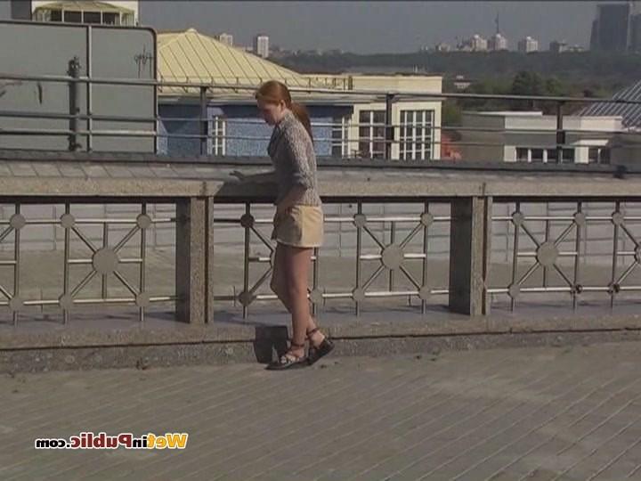 12P Disconcerted cutie splashes her skirt and legs with pee in the street