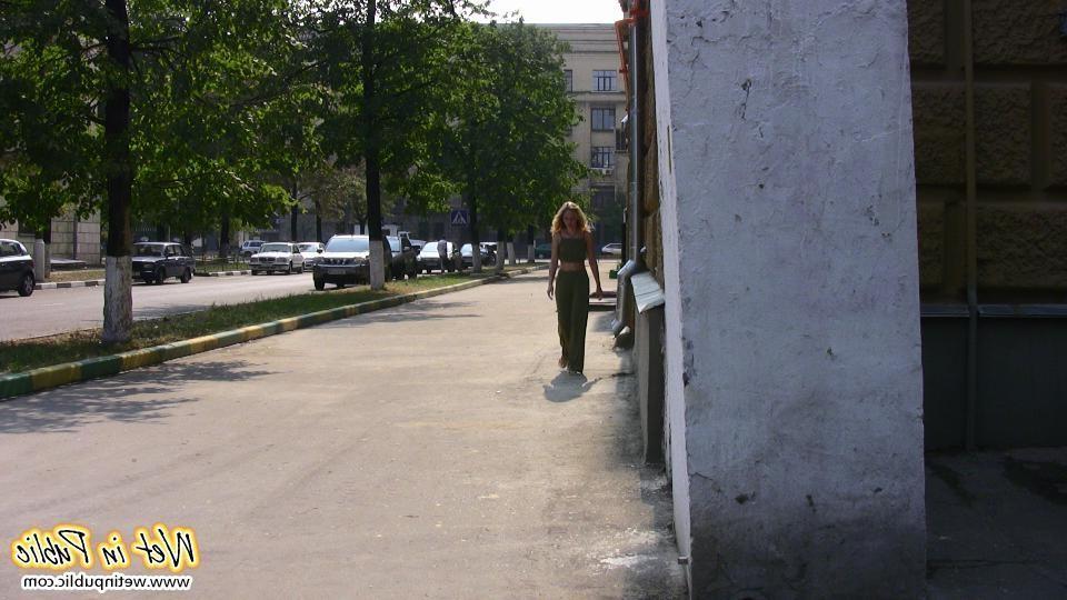 12P Blonde slim slut in green does a lil job right in the pants in public